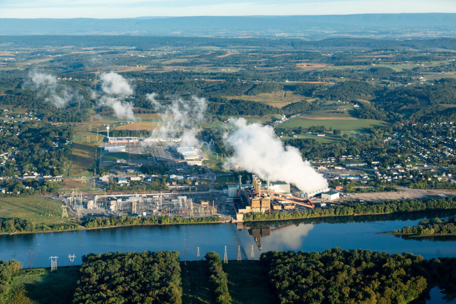 An aerial view of a gas-fired power plant on the shore of the Susquehanna River.